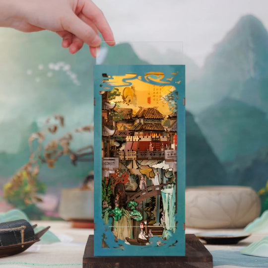 Diorama chinois L'Écritoire de Brume en bois entre deux livres