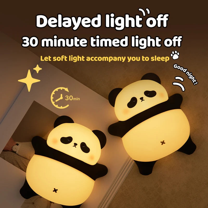 Veilleuse panda silicone tactile, sur une table de chevet
